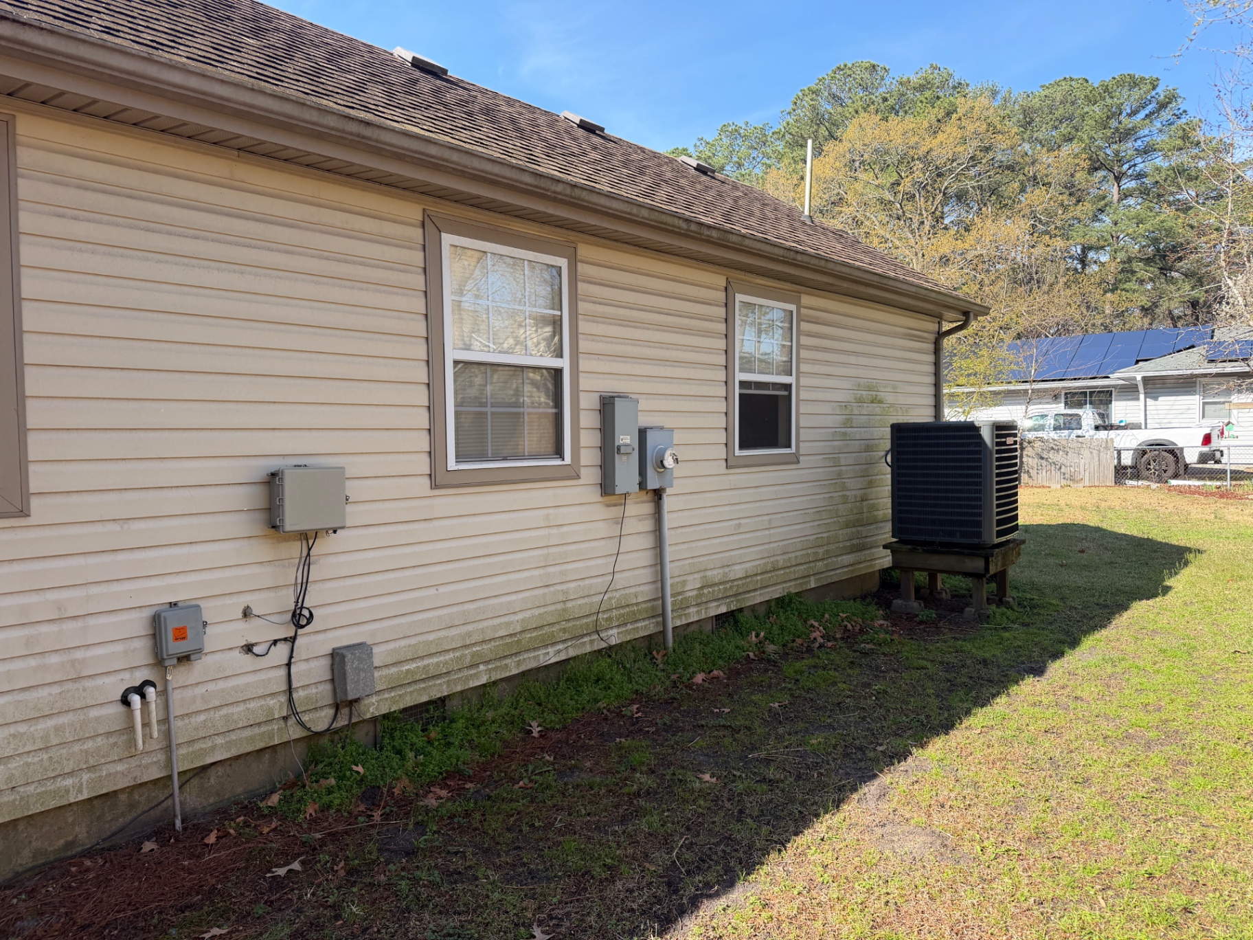 Before — Vinyl siding — algae & mildew removed